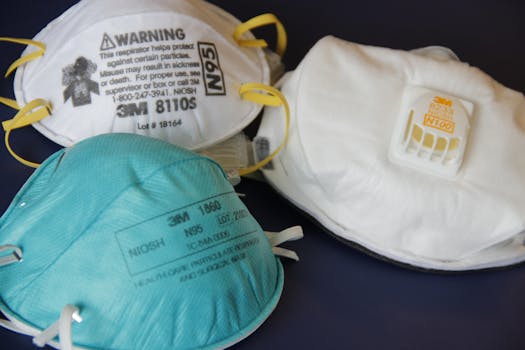 Assorted N95 and surgical masks for respiratory protection against harmful particles.