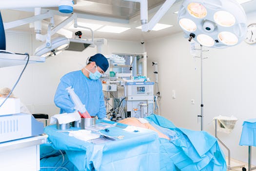 Experienced surgeon performing a procedure in a well-equipped operating room.